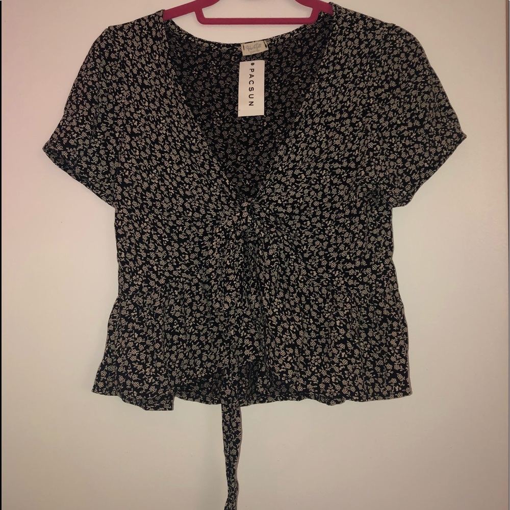 Floral tee, tie blouse.